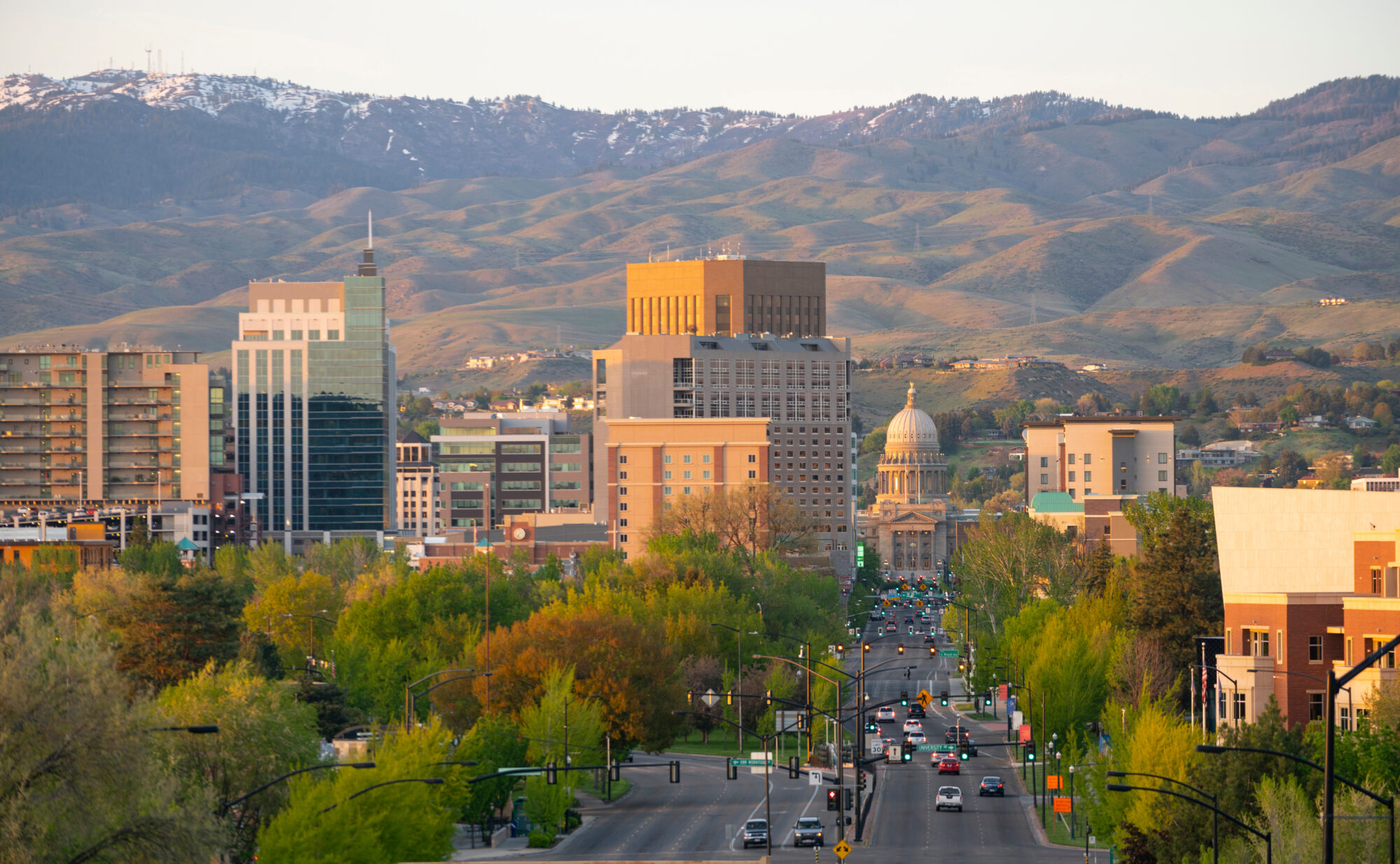 The Idaho State Capital Building Peaks Out Between Structures in Boise