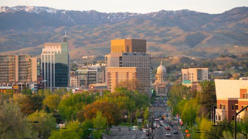 The Idaho State Capital Building Peaks Out Between Structures in Boise