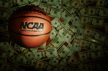 Eveleth, MN USA 03 08 2022: An NCAA Final Four Edition basketball surrounded by money