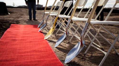 Construction ground breaking ceremony with red carpet